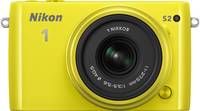 Nikon 1 S2 in gelb mit Nikkor 11-275 von vorne