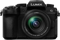 Panasonic Lumix DC-G91 in schwarz mit G Vario 12-60mm von vorne Panasonic Lumix DC-G91 in schwarz mit G Vario 12-60mm von vorne