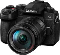 Panasonic Lumix DC-G97 mit G Vario 14-140mm f35-56 asph von schräg vorne links