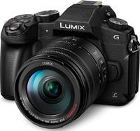 Panasonic Lumix DMC-G81 in schwarz mit G Vario 14-140 mm von vorne links